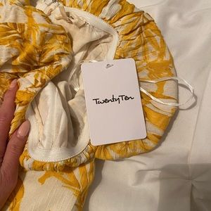 Floor length, strapless maxi dress with side slit. Never worn. Yellow floral